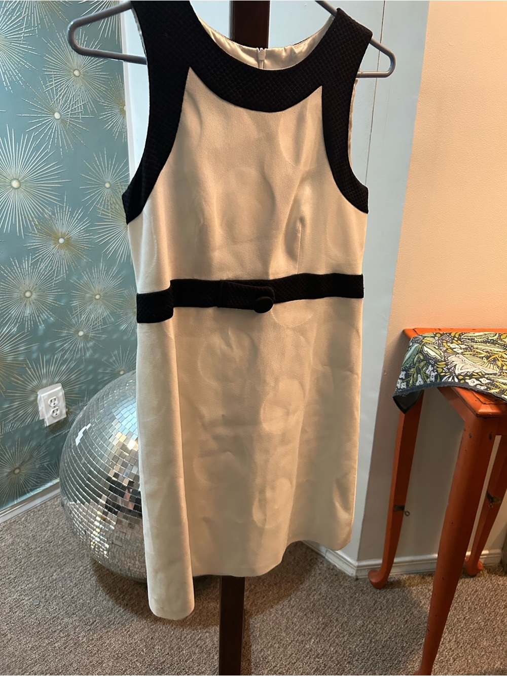 Julie Haus Sleeveless Cream Mini Dress with Black Trim and Waist Detail